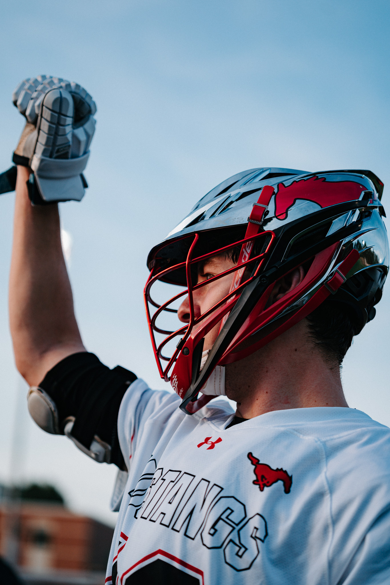 Middle Creek goalie raising his stick before play